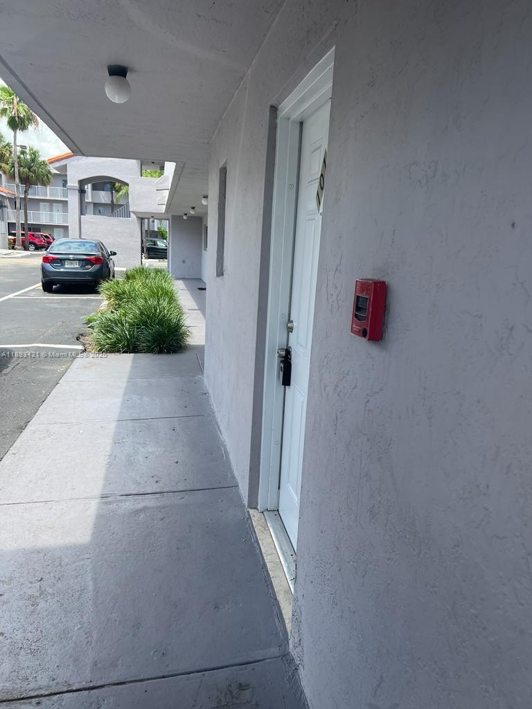 2670 West 76th Street, Unit 101 Hialeah, FL 33016 - Photo 30 of 35 a view of a car garage