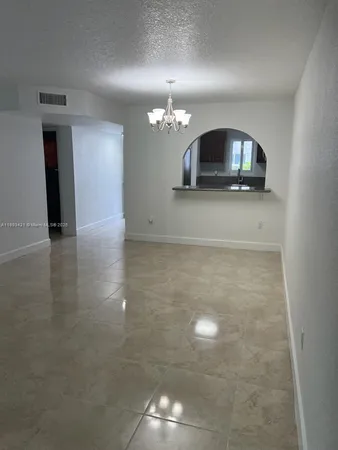 a view of a hallway with entryway