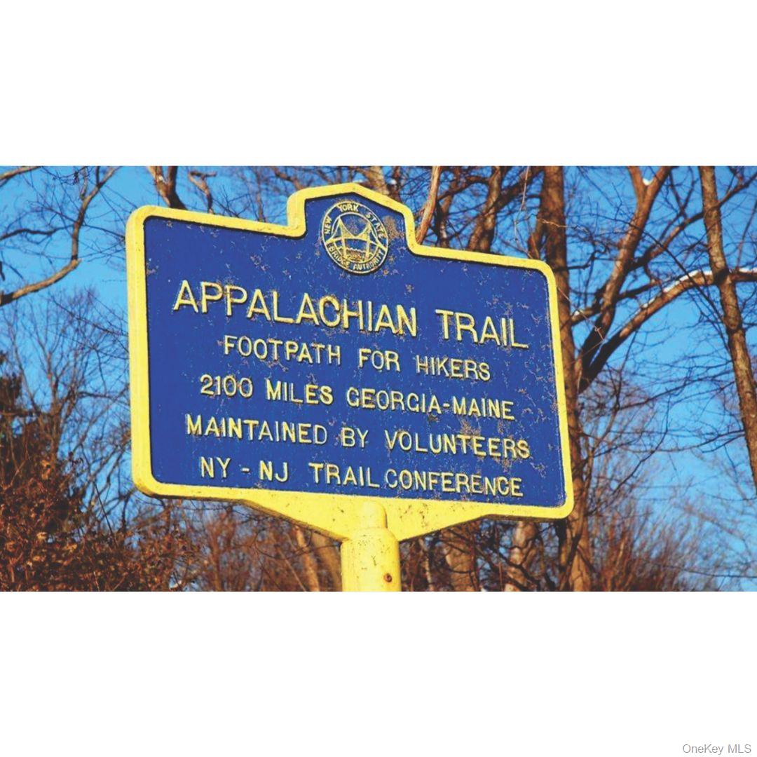 1181 Lakes Road Monroe, NY 10950 - Photo 10 of 11 a sign broad in front of the house