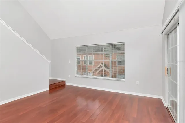 a kitchen with stainless steel appliances granite countertop a stove and a sink