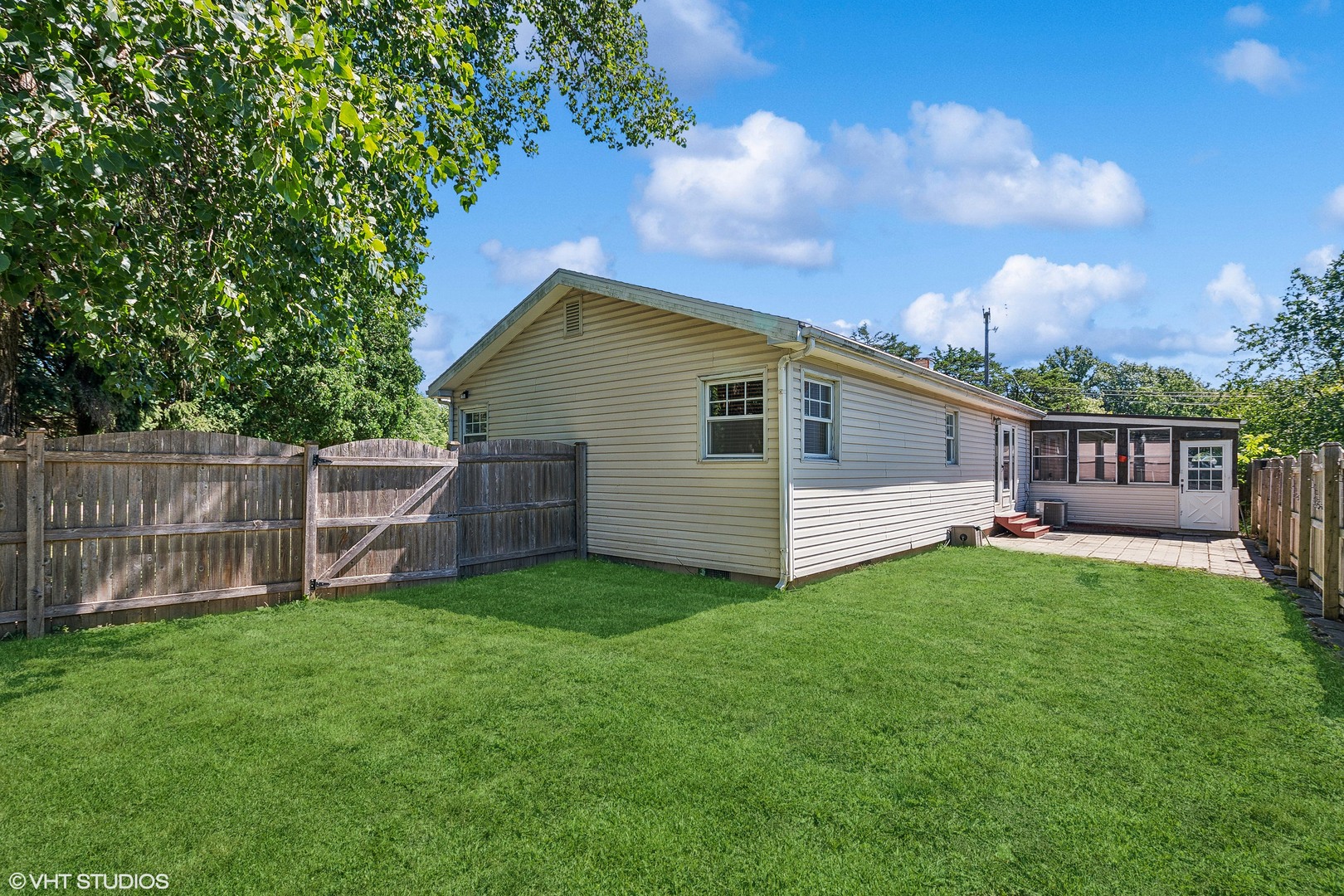 304 Hillside Road New Lenox, IL 60451 - Photo 14 of 16 a view of a house with a yard and sitting area