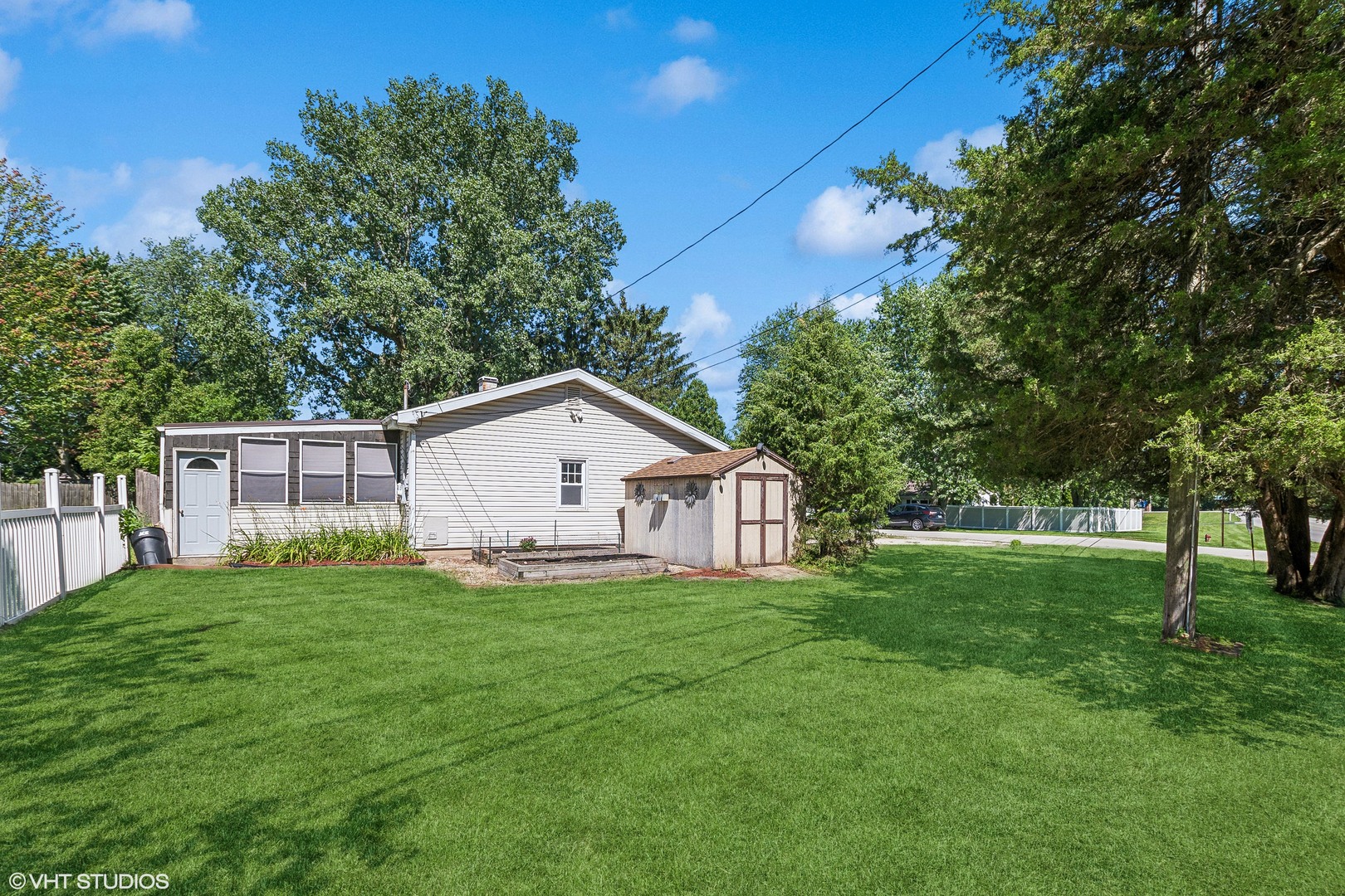 304 Hillside Road New Lenox, IL 60451 - Photo 15 of 16 a view of a house with a yard