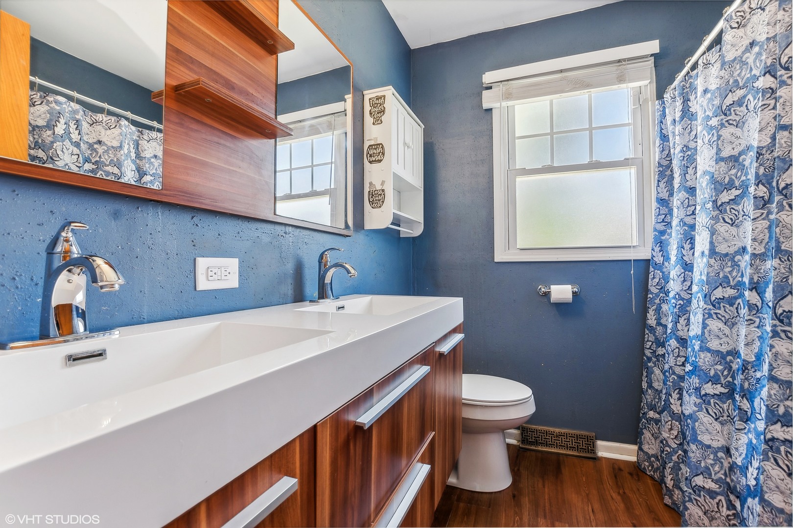 304 Hillside Road New Lenox, IL 60451 - Photo 10 of 16 a bathroom with a sink a toilet and a window