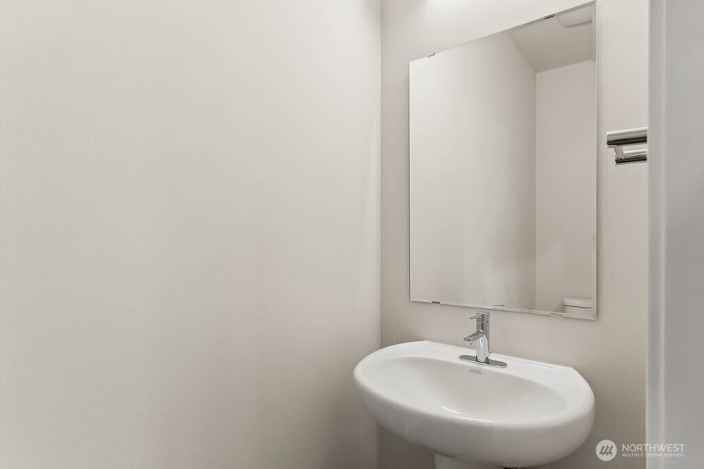 3819 194th Place Southeast Bothell, WA 98012 - Photo 5 of 33 a bathroom with a sink and a mirror