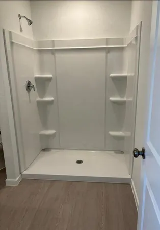 a bathroom with a toilet and a sink