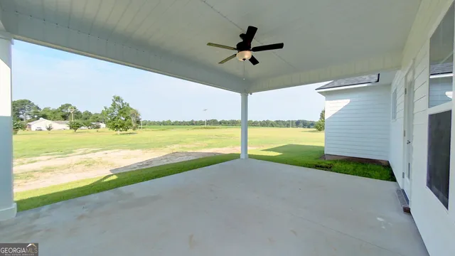 a view of a water heater and a big room