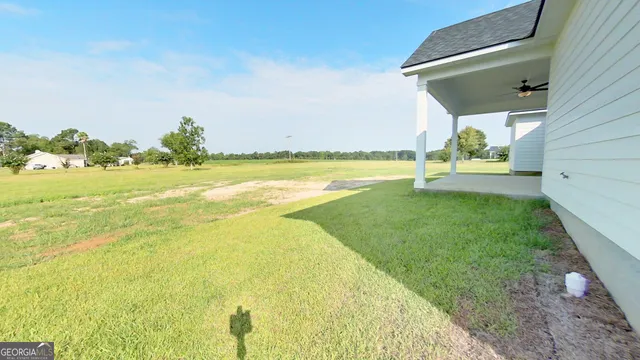 a view of a swimming pool and an ocean view
