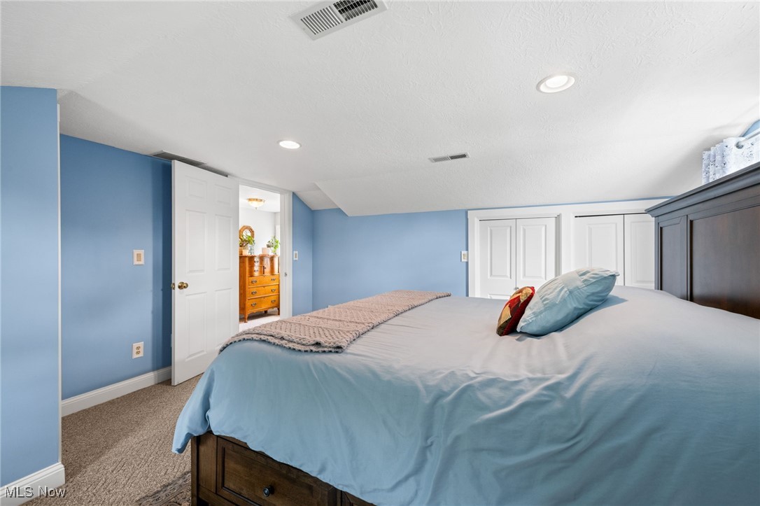 3945 Columbia Road Medina, OH 44256 - Photo 21 of 40 Bedroom with carpet floors, recessed lighting, and a textured ceiling