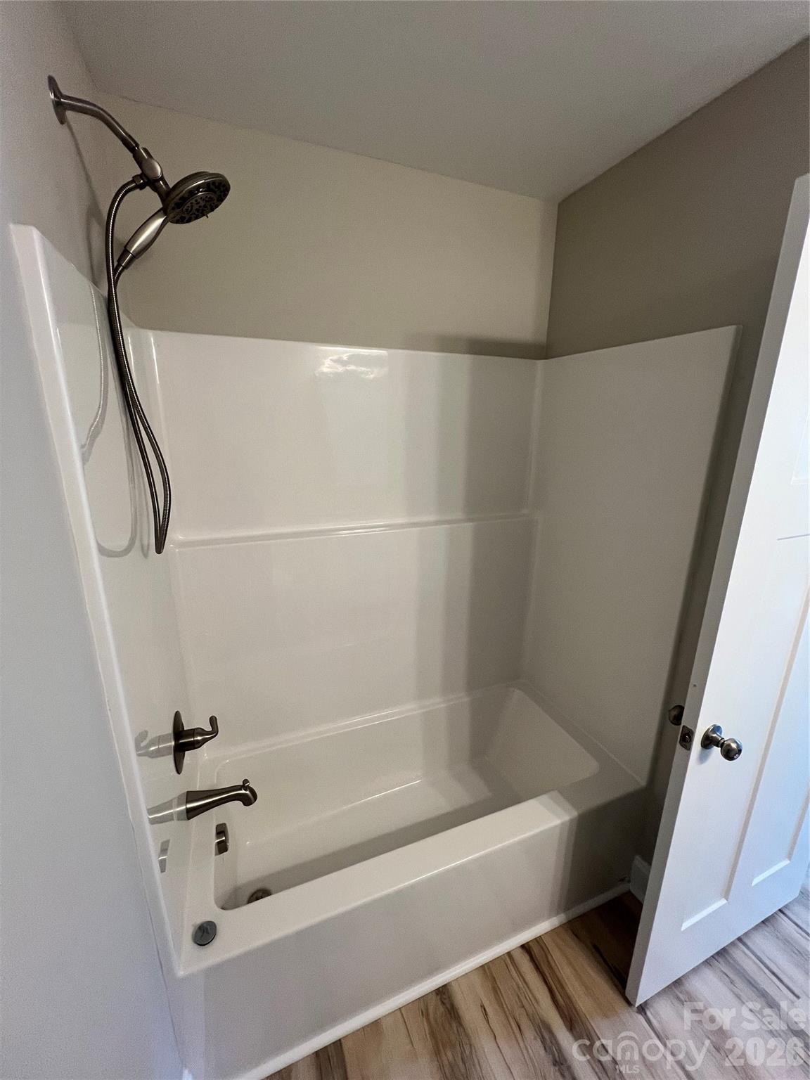 722 Austin Street Albemarle, NC 28001 - Photo 17 of 22 a bathroom with a bathtub