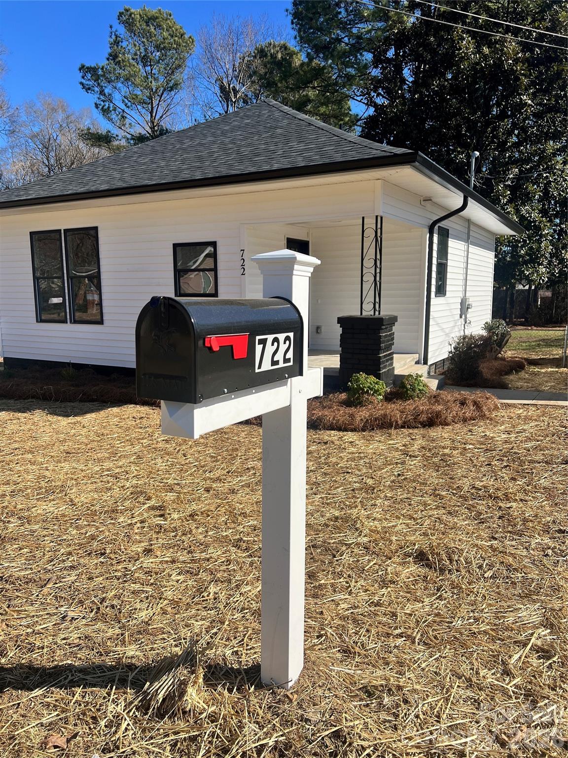 722 Austin Street Albemarle, NC 28001 - Photo 2 of 22 a front view of a house with parking area