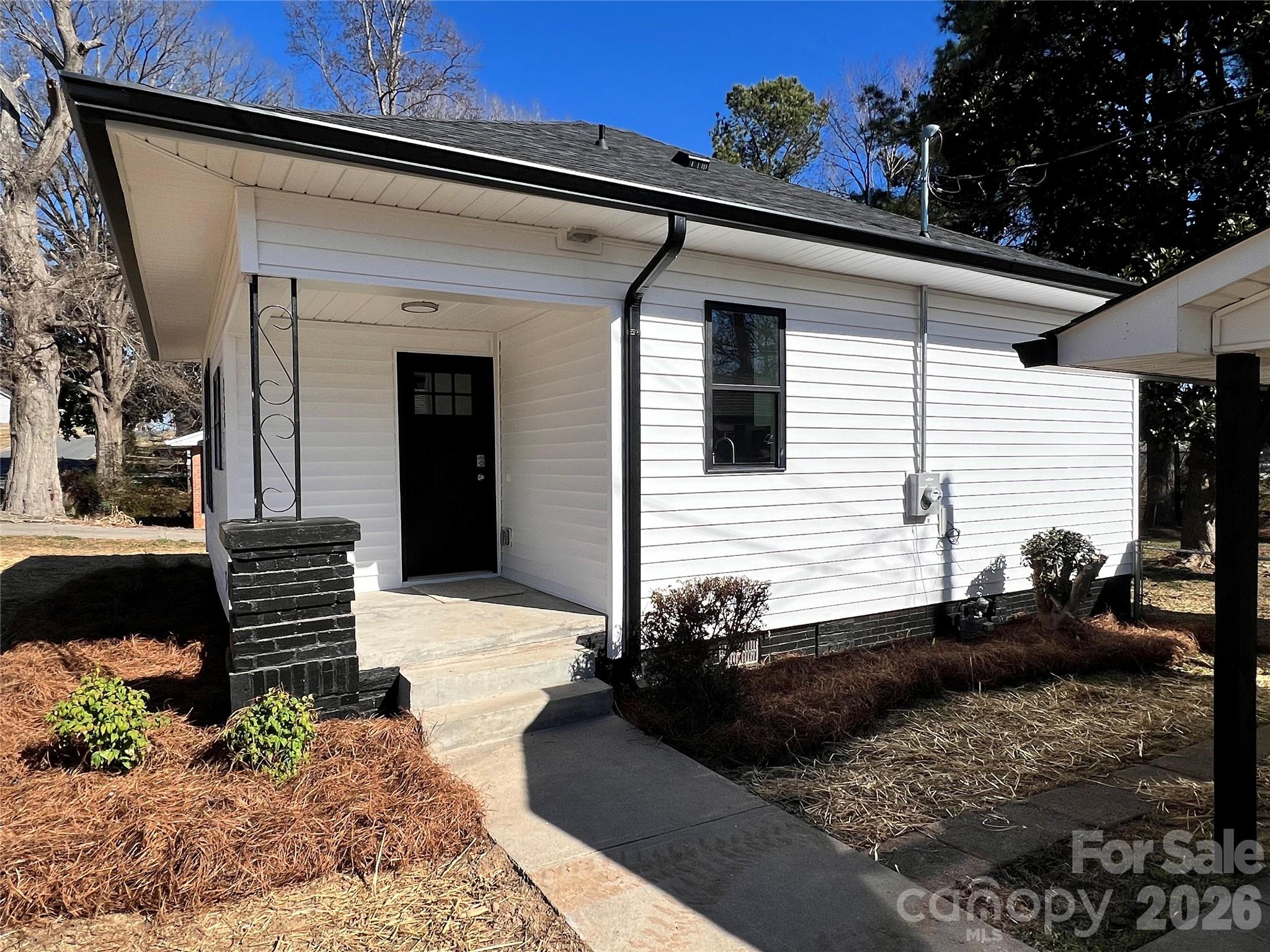 722 Austin Street Albemarle, NC 28001 - Photo 3 of 22 a view of a house with a yard