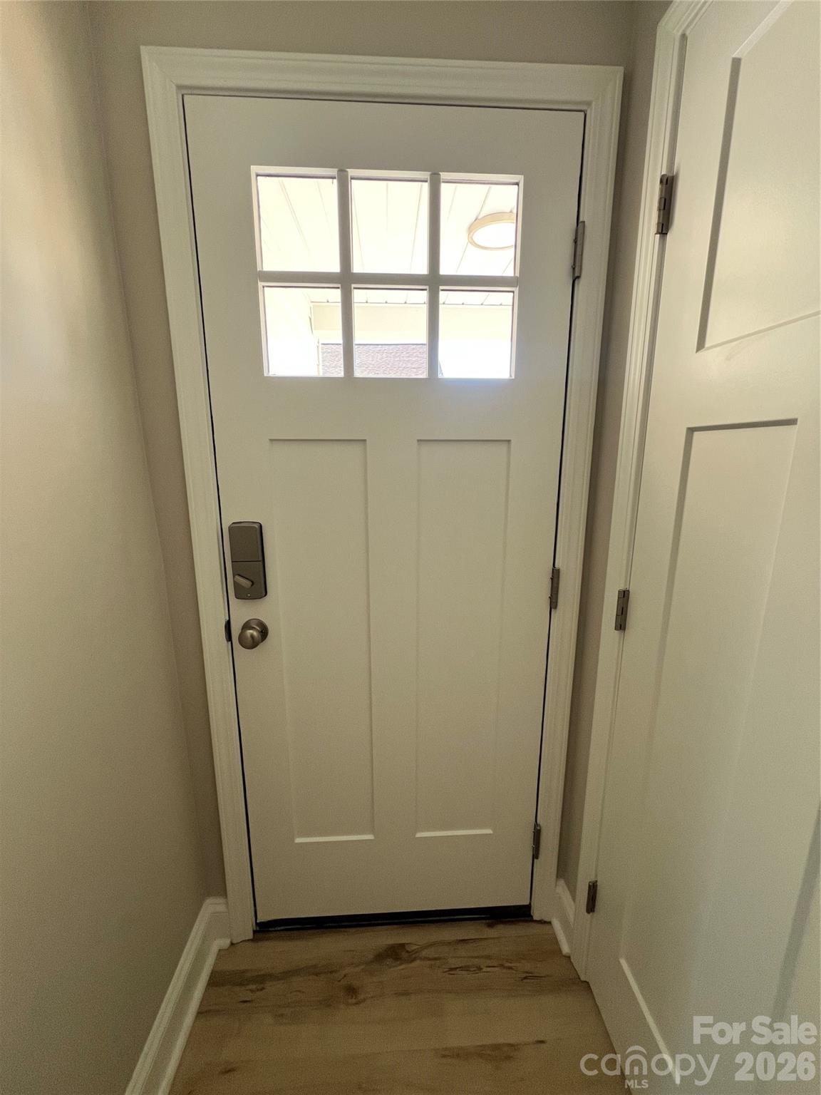 722 Austin Street Albemarle, NC 28001 - Photo 5 of 22 a view of front door with wooden floor