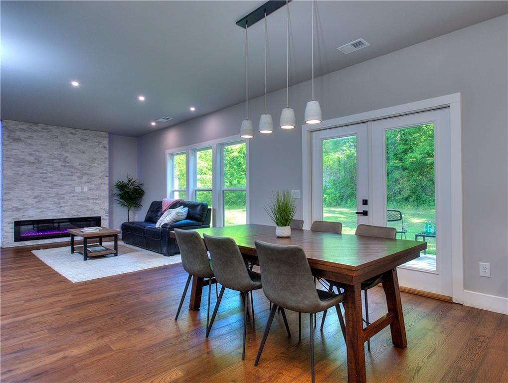 419 Mc Innes Circle Marietta, GA 30060 - Photo 13 of 33 a view of a dining room with furniture window and wooden floor