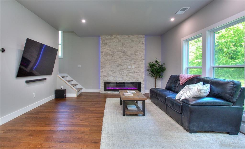 419 Mc Innes Circle Marietta, GA 30060 - Photo 14 of 33 a living room with furniture and a flat screen tv