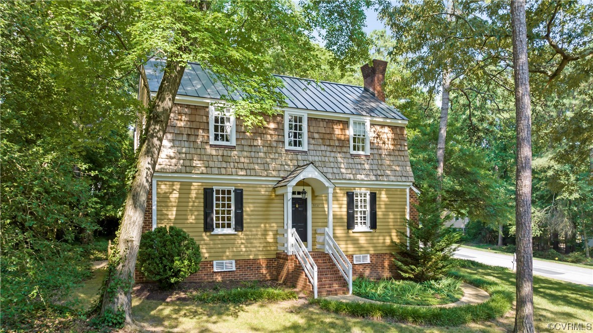 front view of a house with a yard
