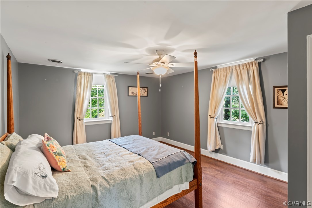 9737 Cole Mill Road Richmond, VA 23237 - Photo 13 of 50 a bedroom with a bed and a window