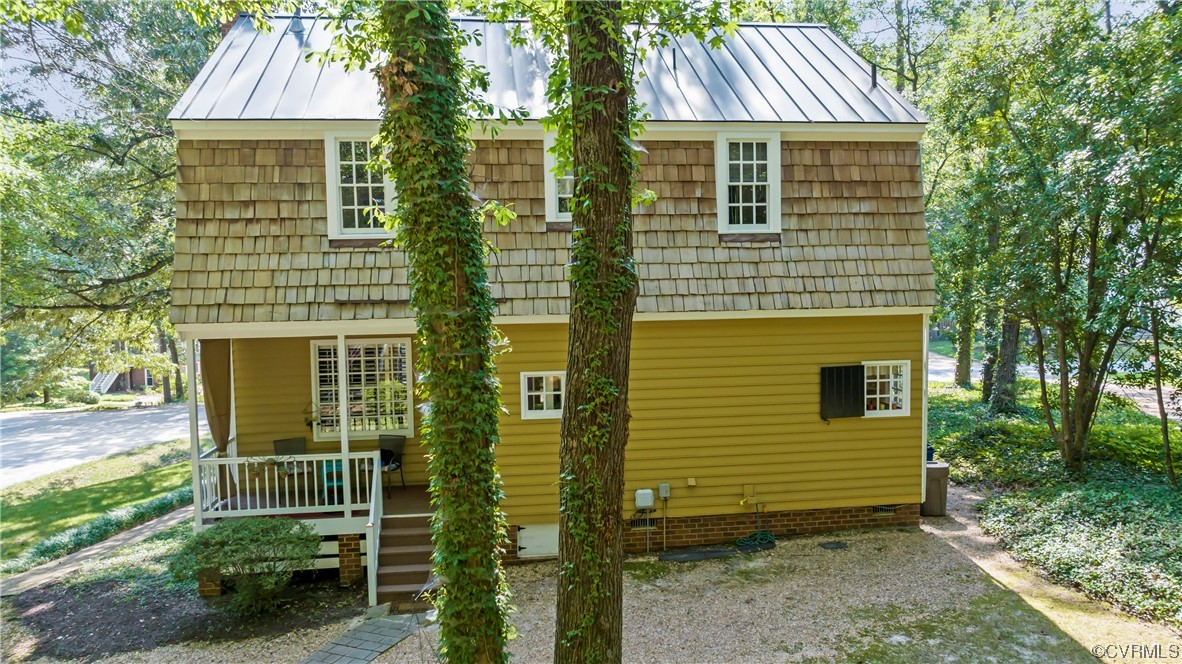 9737 Cole Mill Road Richmond, VA 23237 - Photo 15 of 50 a view of front of house with a yard