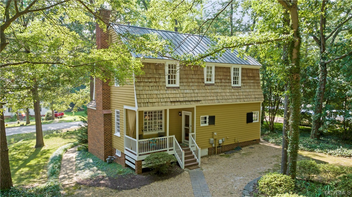 9737 Cole Mill Road Richmond, VA 23237 - Photo 19 of 50 a view of a house with a yard