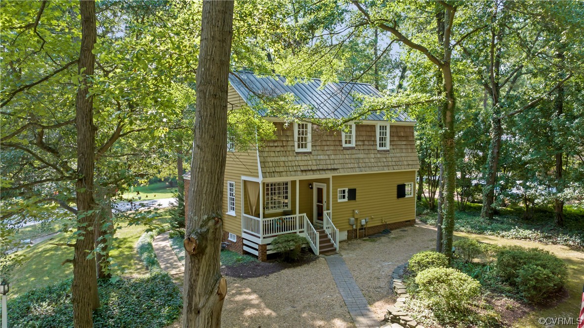 9737 Cole Mill Road Richmond, VA 23237 - Photo 20 of 50 a front view of a house with a yard