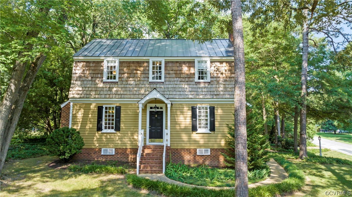 9737 Cole Mill Road Richmond, VA 23237 - Photo 26 of 50 a front view of a house with a yard