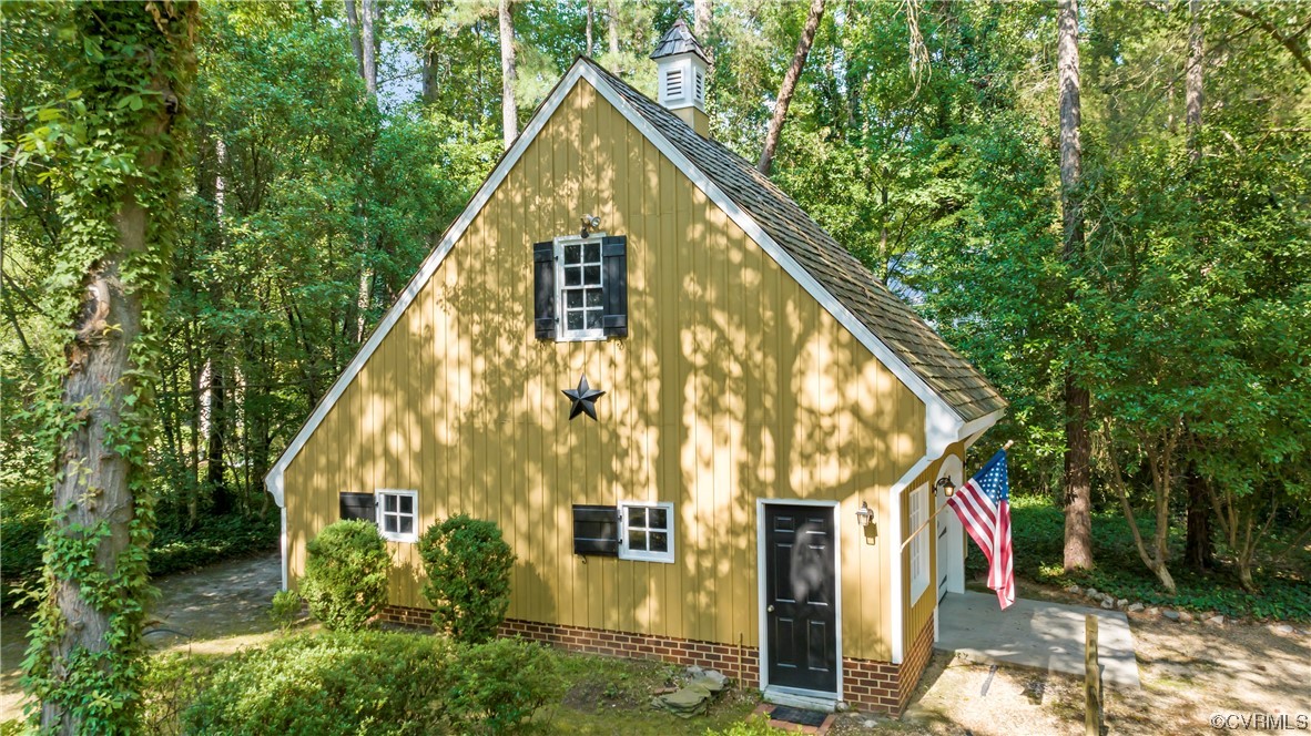 9737 Cole Mill Road Richmond, VA 23237 - Photo 36 of 50 a view of residential house with wooden stairs