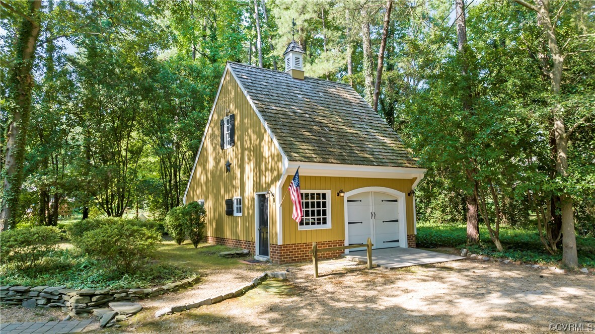 9737 Cole Mill Road Richmond, VA 23237 - Photo 39 of 50 a front view of a house with a yard