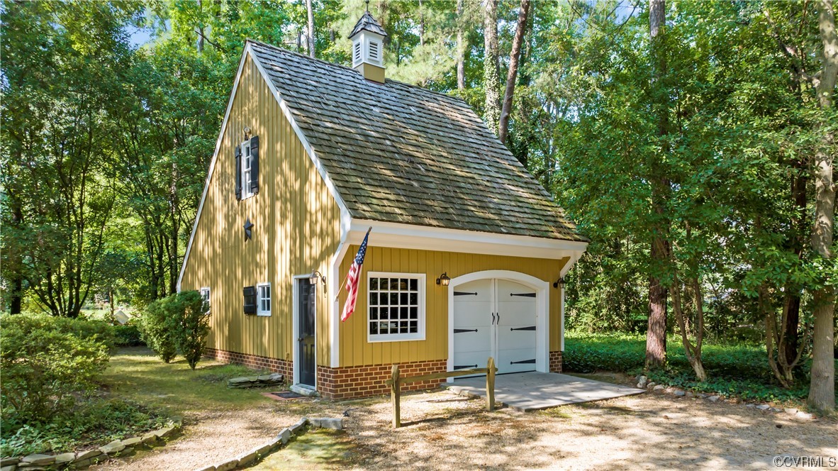 9737 Cole Mill Road Richmond, VA 23237 - Photo 40 of 50 a view of a house with a yard