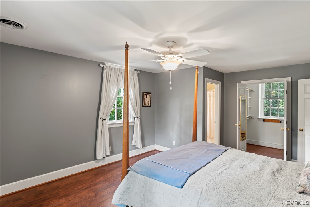 9737 Cole Mill Road Richmond, VA 23237 - Photo 50 of 50 a bedroom with a bed ceiling fan and a window