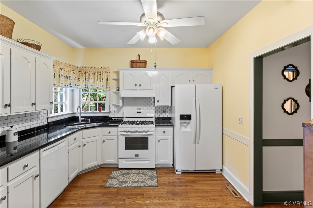 9737 Cole Mill Road Richmond, VA 23237 - Photo 10 of 50 a kitchen with a white cabinets stove and oven