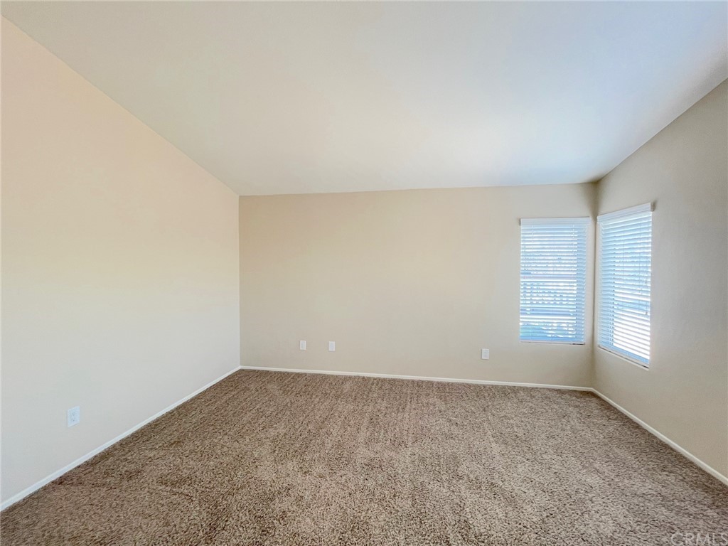 651 Pointe Vista Lane Corona, CA 92881 - Photo 14 of 19 an empty room with a window