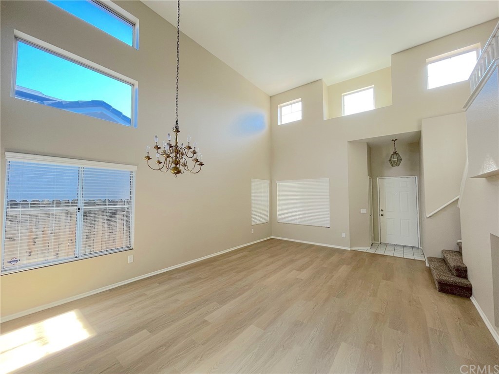 651 Pointe Vista Lane Corona, CA 92881 - Photo 4 of 19 a view of an empty room with a window