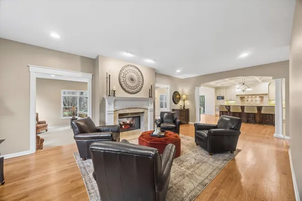 a large kitchen with granite countertop lots of counter space and a sink