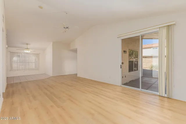 a view of an empty room and window