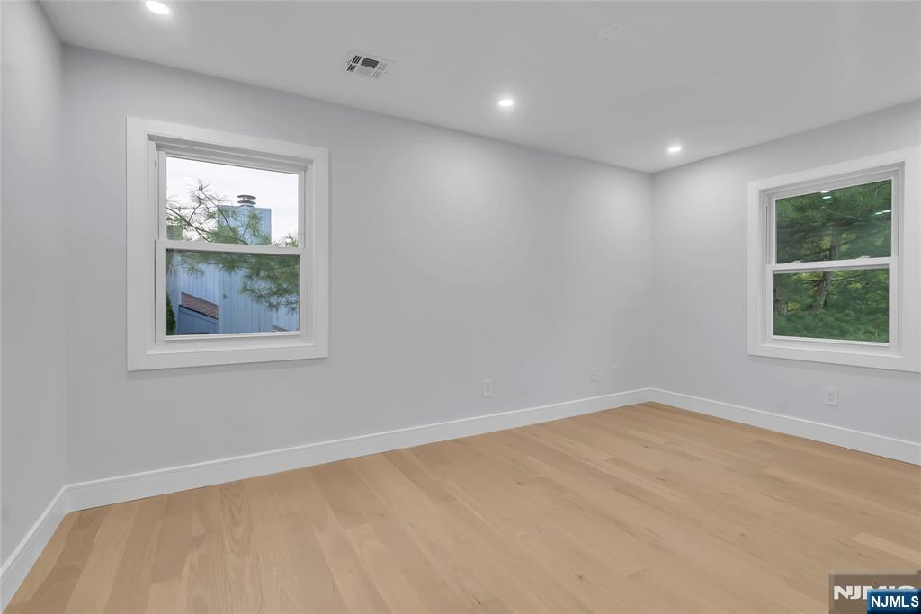 76 Point View Parkway Wayne, NJ 07470 - Photo 21 of 44 a view of an empty room with a window