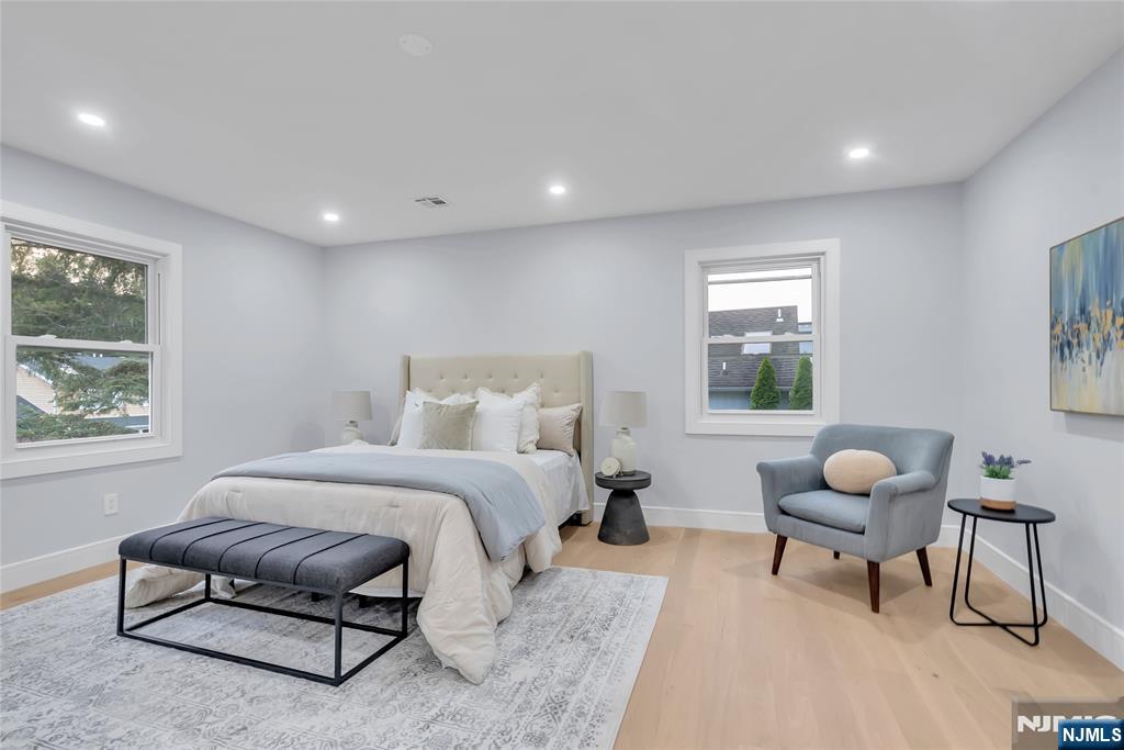 76 Point View Parkway Wayne, NJ 07470 - Photo 23 of 44 a bedroom with a bed and window