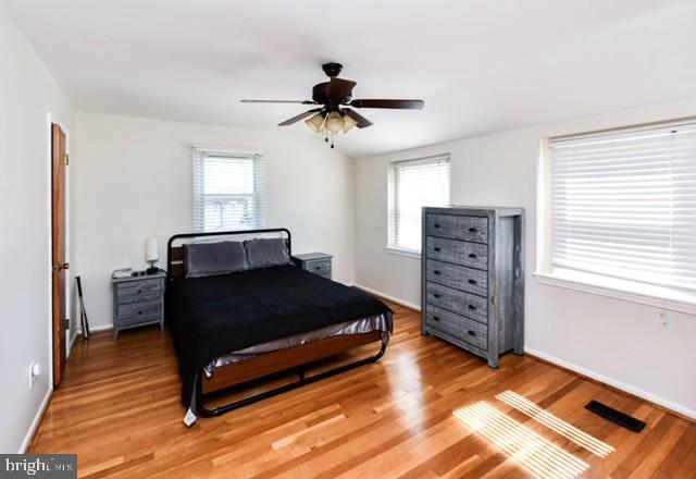 120 Old Enterprise Road, Unit 115 Upper Marlboro, MD 20774 - Photo 22 of 43 a bedroom with a bed and a window