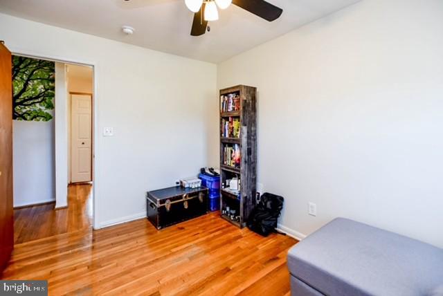 120 Old Enterprise Road, Unit 115 Upper Marlboro, MD 20774 - Photo 29 of 43 a room with a bed and a chandelier