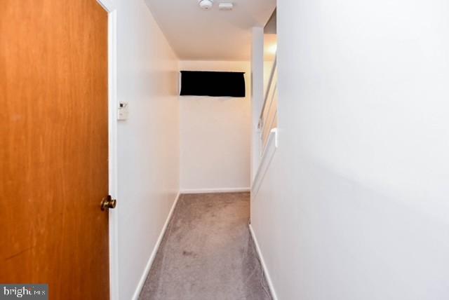 120 Old Enterprise Road, Unit 115 Upper Marlboro, MD 20774 - Photo 32 of 43 a view of a hallway