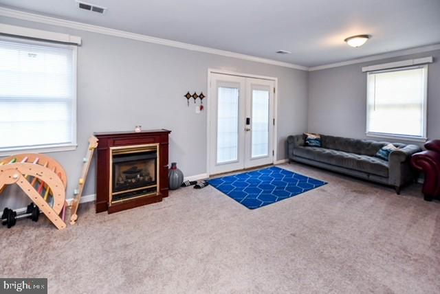 120 Old Enterprise Road, Unit 115 Upper Marlboro, MD 20774 - Photo 33 of 43 a living room with furniture and a fireplace