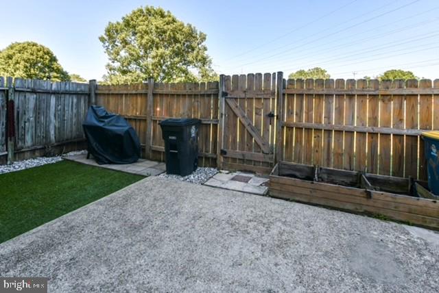 120 Old Enterprise Road, Unit 115 Upper Marlboro, MD 20774 - Photo 40 of 43 a view of a dinning table and chairs in the park