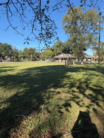 a view of a golf course with a lake