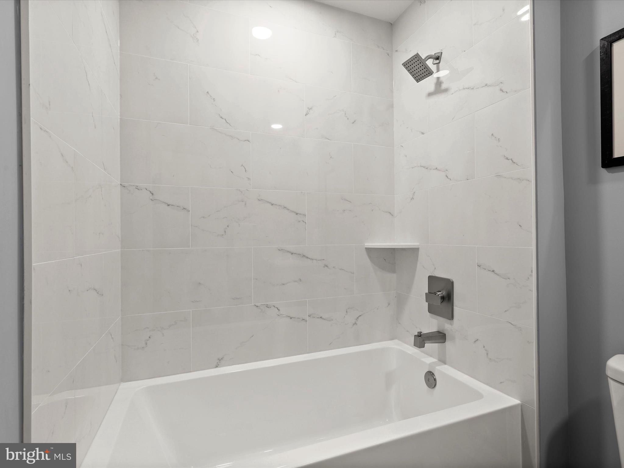 4708 Maryknoll Road Baltimore, MD 21208 - Photo 24 of 44 a bathroom with a bathtub