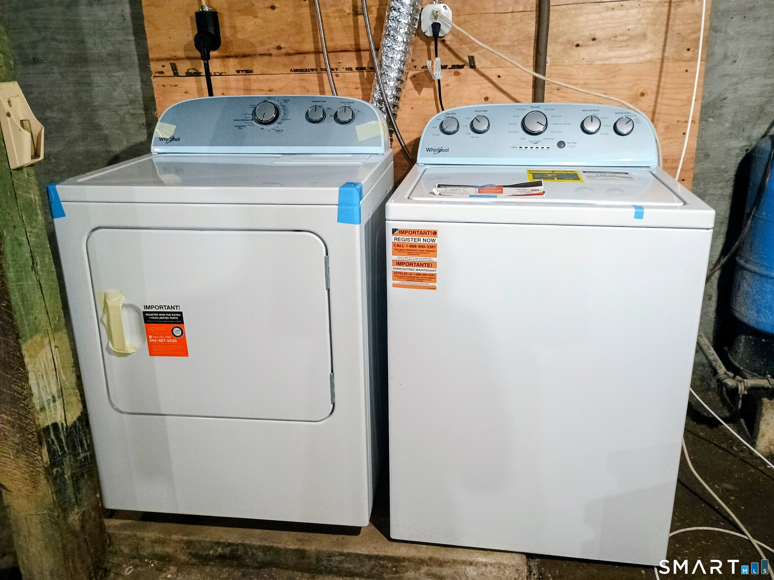633 Wauregan Road Brooklyn, CT 06234 - Photo 14 of 17 a utility room with dryer and washer