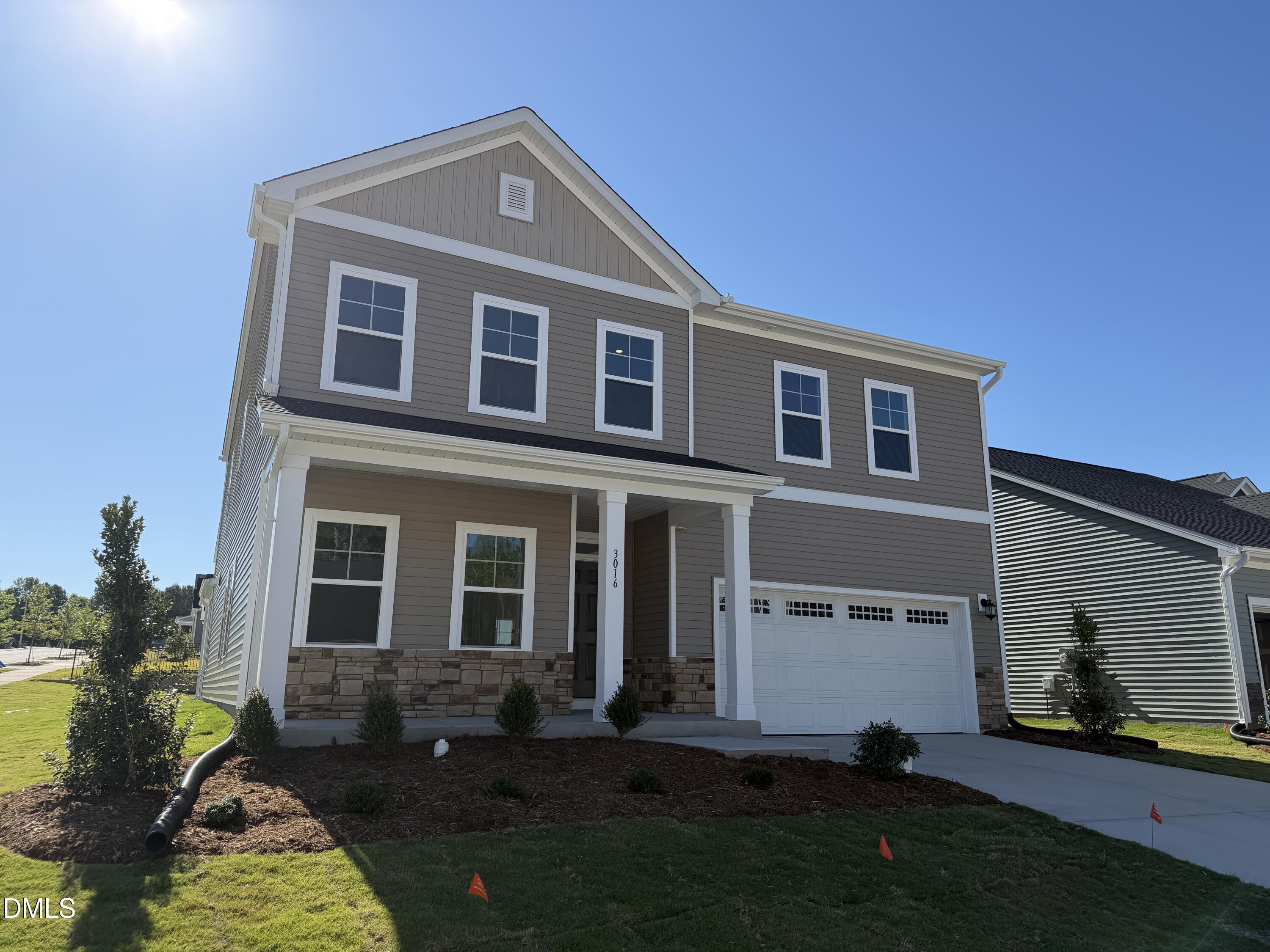 3016 Sandy Bluff Road Raleigh, NC 27616 - Photo 2 of 34 a front view of a house with garden