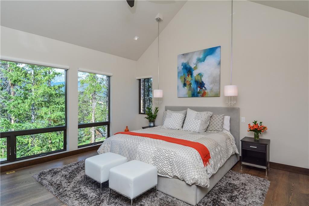 33 Rounds Road Breckenridge, CO 80424 - Photo 13 of 25 a bedroom with a bed and wooden floor