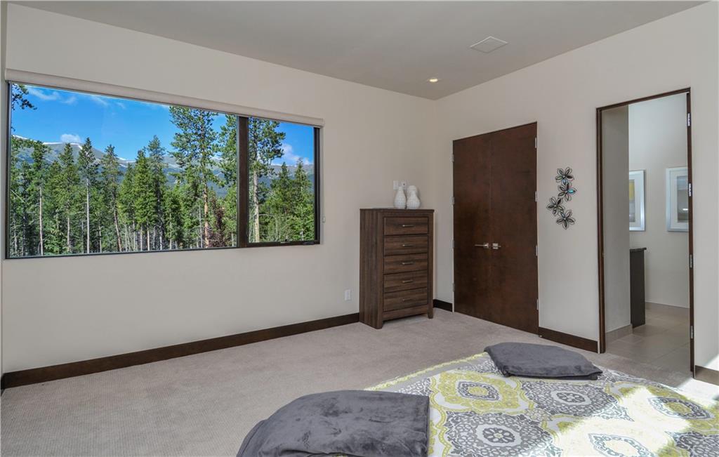 33 Rounds Road Breckenridge, CO 80424 - Photo 17 of 25 a bedroom with a bed and a window