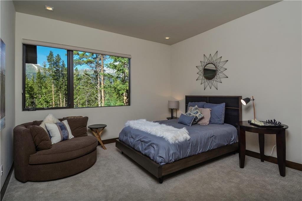 33 Rounds Road Breckenridge, CO 80424 - Photo 19 of 25 a bedroom with a bed and window