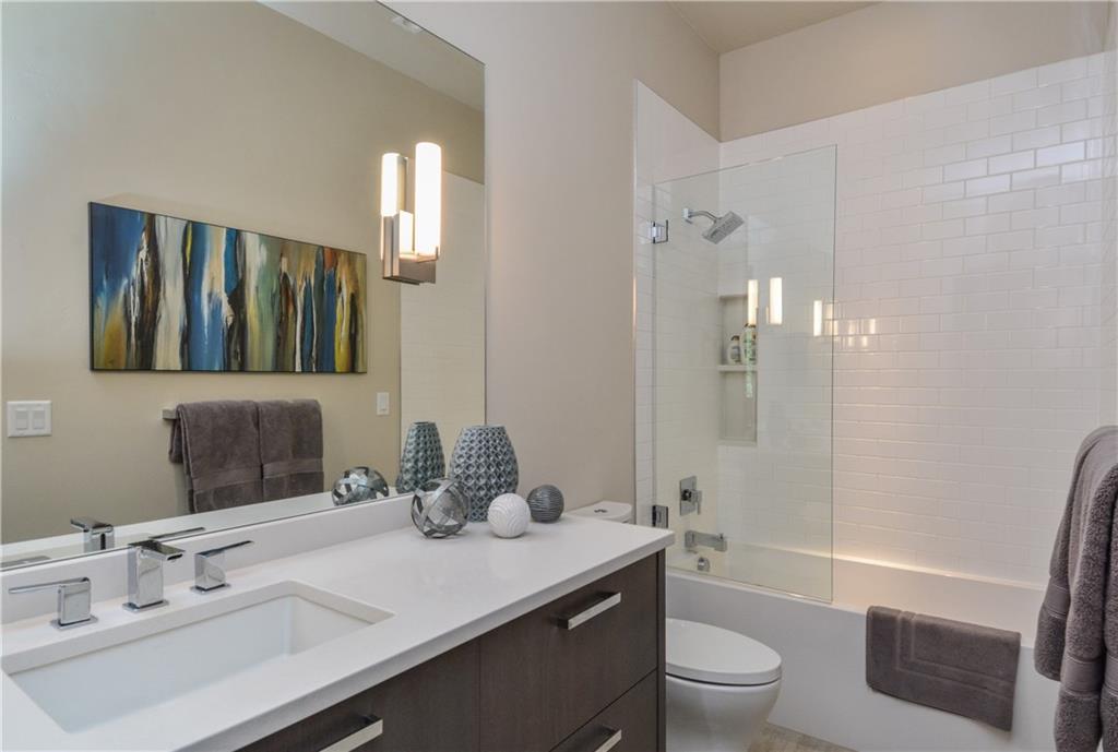 33 Rounds Road Breckenridge, CO 80424 - Photo 20 of 25 a bathroom with a sink a toilet a tub and shower