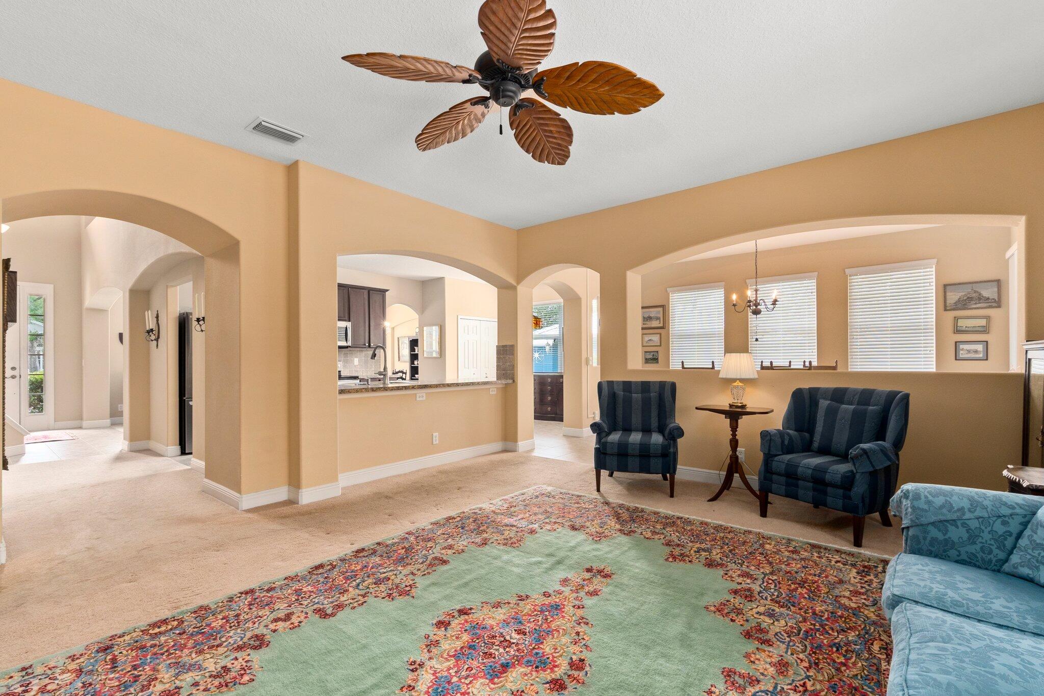 2309 Southwest Ivory Road Port St. Lucie, FL 34953 - Photo 17 of 46 a living room with furniture rug and window