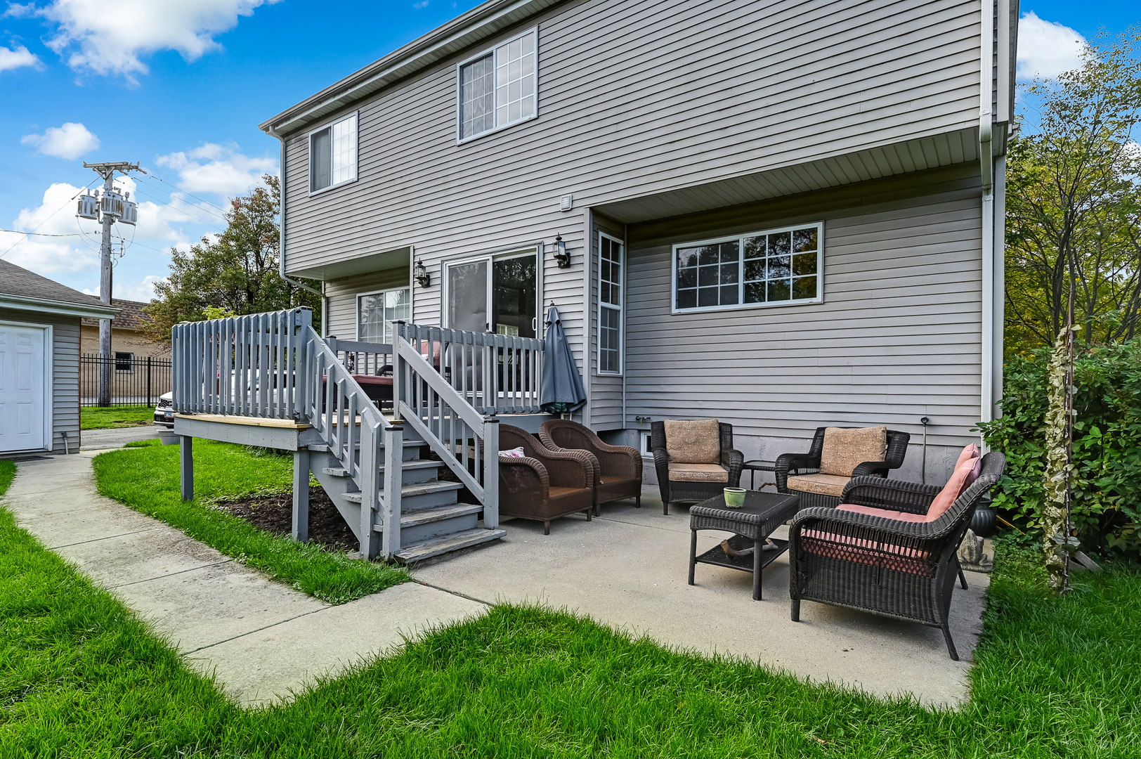 1934 Manning Road Darien, IL 60561 - Photo 13 of 14 a backyard of a house with a garden and outdoor seating